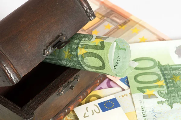 A treasure chest and euro bills