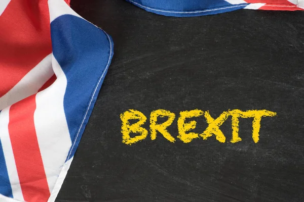 Flag of Great Britain, chalk board and the word Brexit