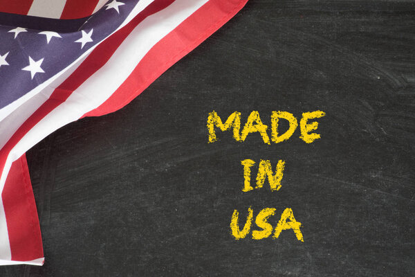 Flag of USA, chalk board and slogan Made in USA