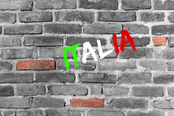 一堵古老的墙和一个词意大利 — 图库照片