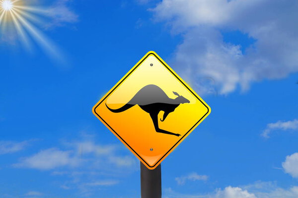 Sun, blue sky and a traffic warning in front of Kangaroos in Australia
