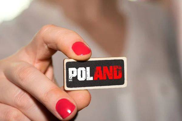 女性と刻印ポーランドの看板 — ストック写真