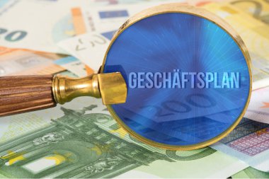 Euro faturaları, büyüteç ve bir iş planı