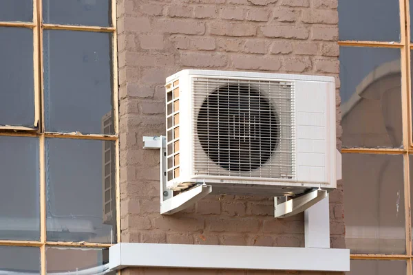 Air conditioning on the wall of a house