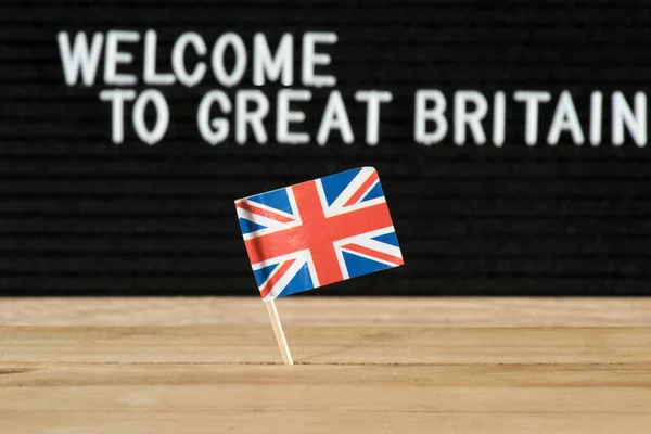 英国国旗和口号欢迎到英国 — 图库照片