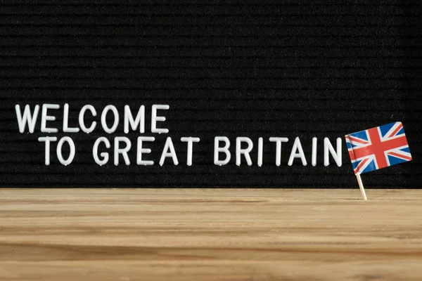 英国国旗和口号欢迎到英国 — 图库照片