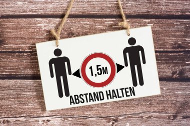 İnsanlar arasındaki minimum mesafeyi gösteren bir işaret