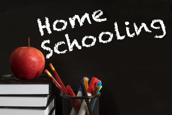 School, blackboard and home schooling