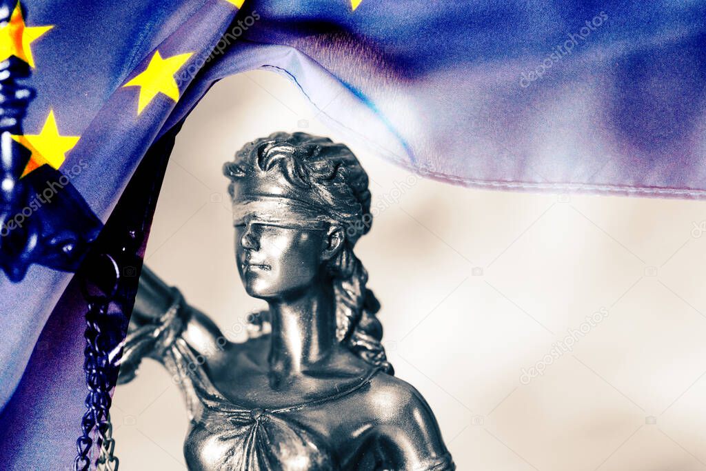 Figure of Justice and flag of the European Union EU