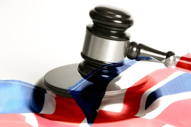 Judge's gavel and flag of Great Britain clipart