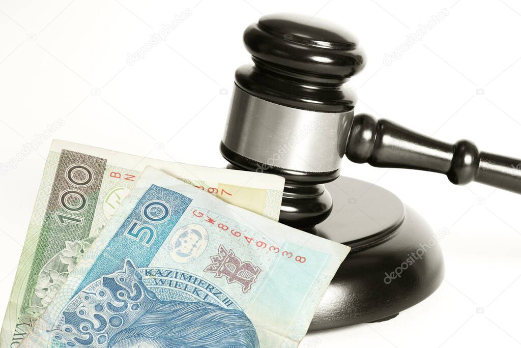 A judge's gavel and money Polish zloty PLN