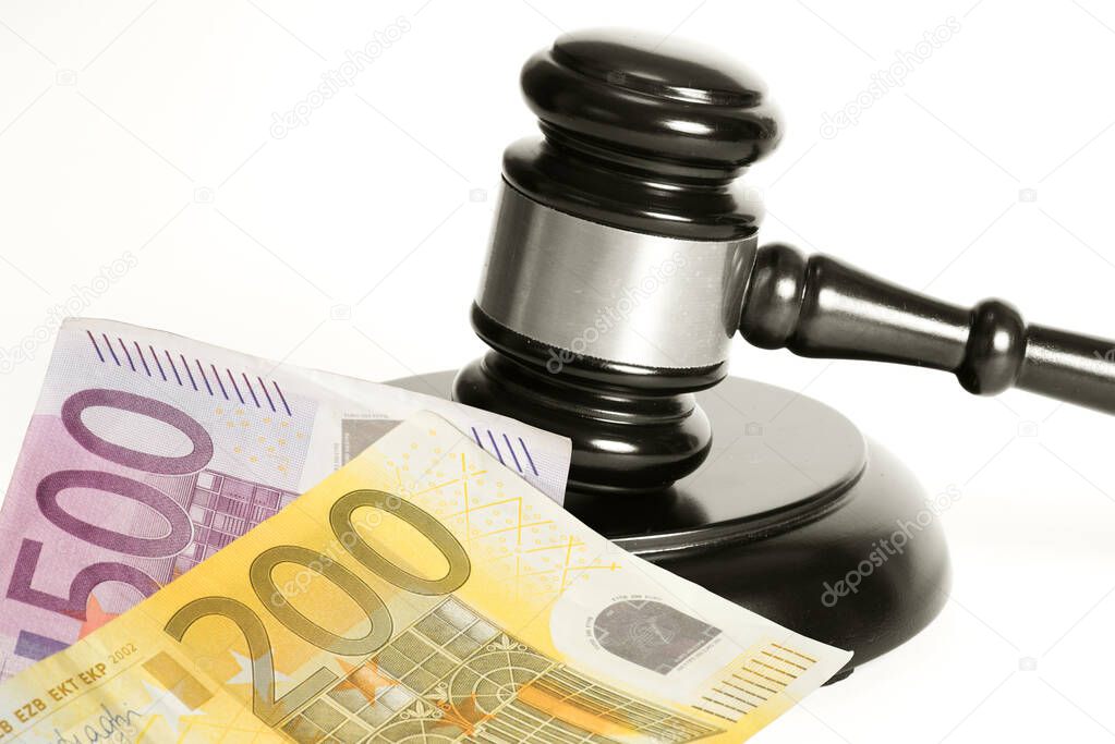 Judge's gavel and euro banknotes