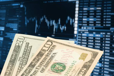 Amerika borsası ve dolar banknotları.