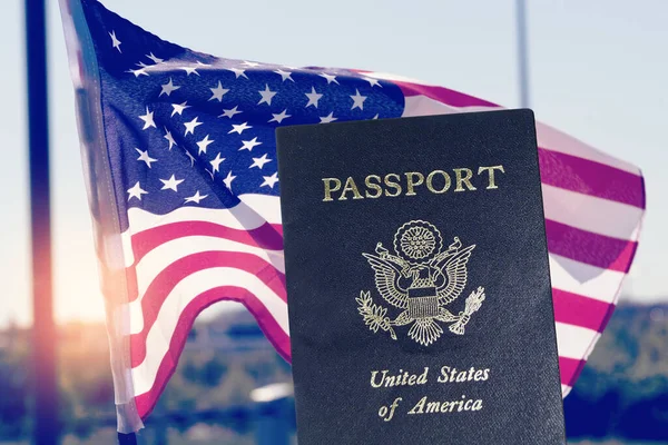 American passport and flag of USA
