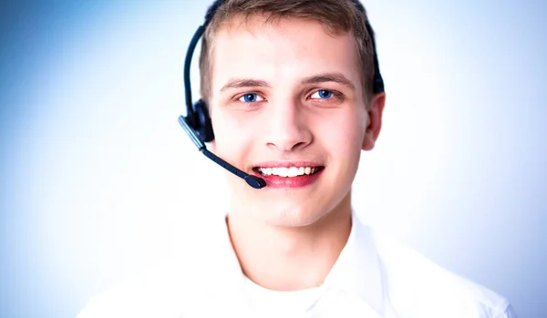 Operador de atención al cliente con auriculares sobre fondo blanco —  Fotos de Stock