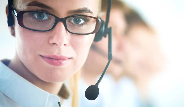 Attractive positive young businesspeople and colleagues in a call center office — Stock Photo, Image