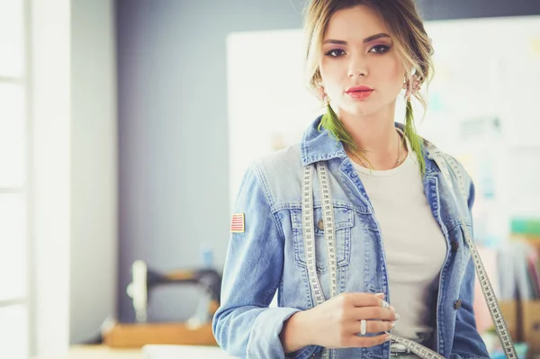 Fashion designer woman working on her designs in the studio — Stock Photo, Image