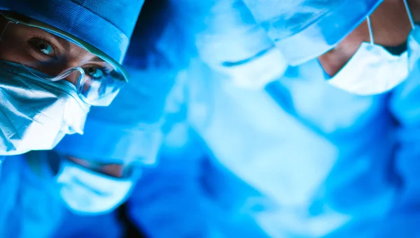 Young surgery team in the operating room — Stock Photo, Image