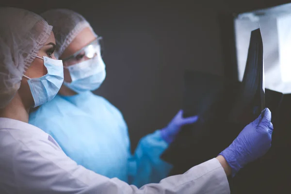 Doctor and patient discussing something while sitting at the table . Medicine and health care concept. Doctor and patient — Stock Photo, Image