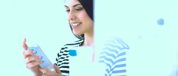 Beautiful young woman in shop — Stock Photo, Image