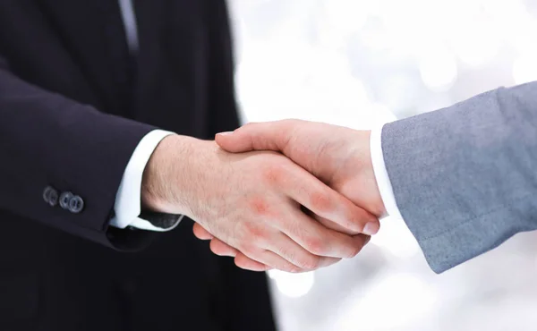 Businessmen shaking hands, isolated on white. — Stock Photo, Image