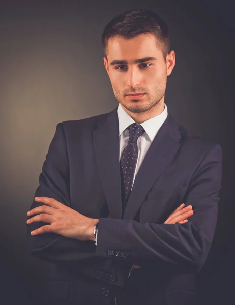 Portret van jonge man geïsoleerd op zwarte achtergrond — Stockfoto