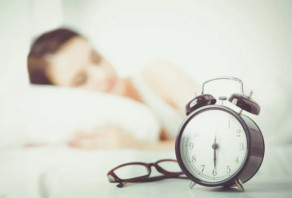 Young beautiful woman lying in bed — Stock Photo, Image