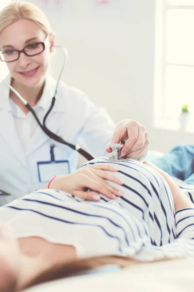 Doctor and patient discussing something while sitting at the table . Medicine and health care concept — Stock Photo, Image