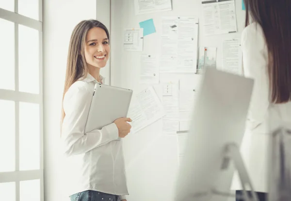 Attractive business woman working on laptop at office. Business people — Stock Photo, Image