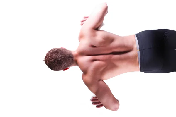 Hombre de fitness haciendo flexiones en el suelo —  Fotos de Stock