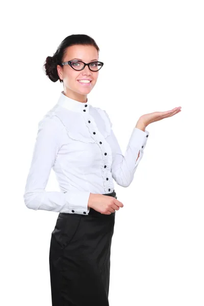 Retrato de una joven mujer de negocios apuntando sobre un fondo blanco — Foto de Stock