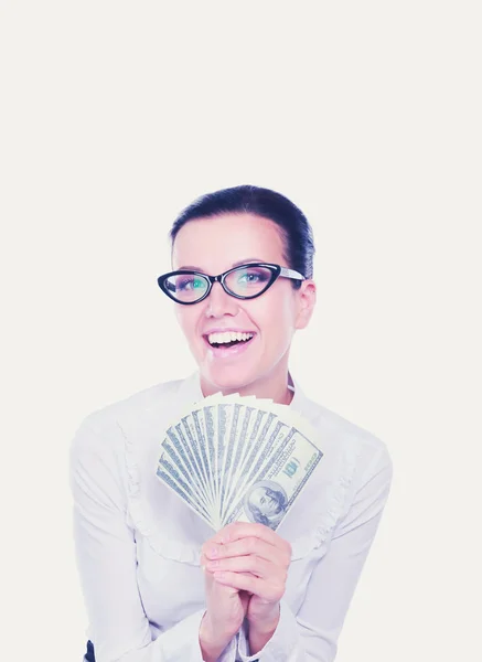 Jeune femme d'affaires tenant de l'argent debout sur fond blanc — Photo