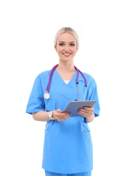 Női orvos egy digitális tabletta és álló fehér háttér. Női orvosok. — Stock Fotó