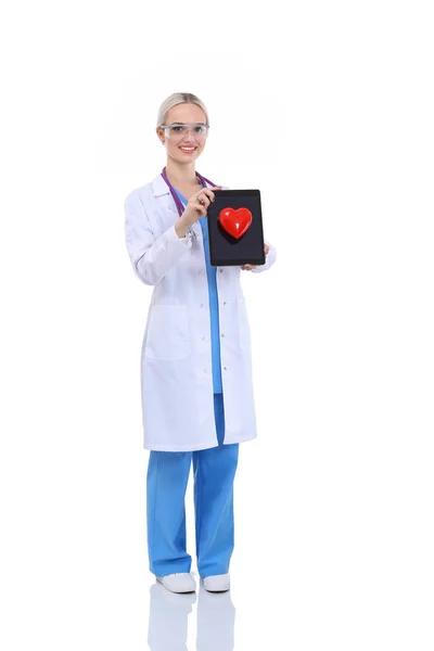 Young woman doctor holding a red heart, isolated on white background. Woman doctor — Stock Photo, Image