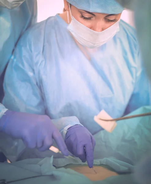 Young surgery team in the operating room — Stock Photo, Image