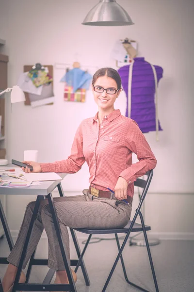 Modern young fashion designer working at studio — Stock Photo, Image