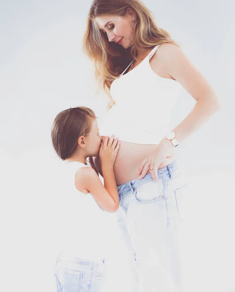 Pregmnant vrouwen en blij meisje. — Stockfoto