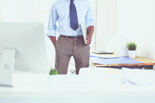 Portrait of an handsome black businessman standing in office — Stock Photo, Image