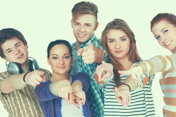 Gäng glada studenter pekar på dig. Isolerade över vit bakgrund — Stockfoto