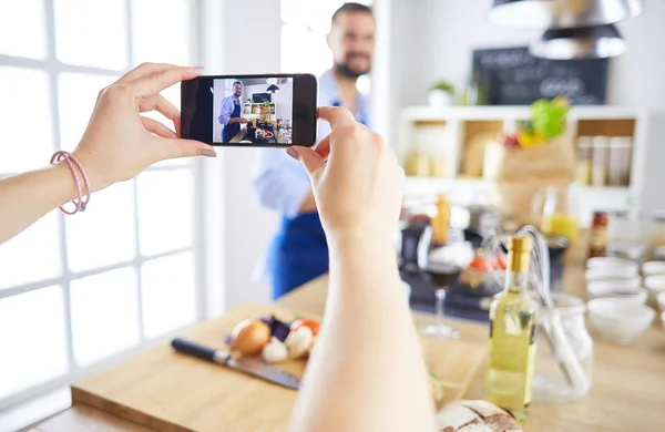 Portrait of handsome man filming cooking show or blog — Stock Photo, Image