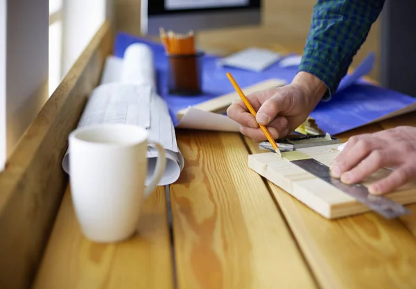 Architect working on drawing table in office — Stock Photo, Image