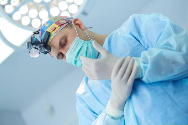 Male surgeon on background in operation room — Stock Photo, Image