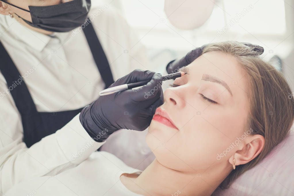 Microblading eyebrows work flow in a beauty salon.