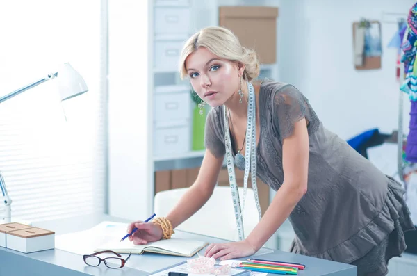 Young fashion designer working at studio. — Stock Photo, Image