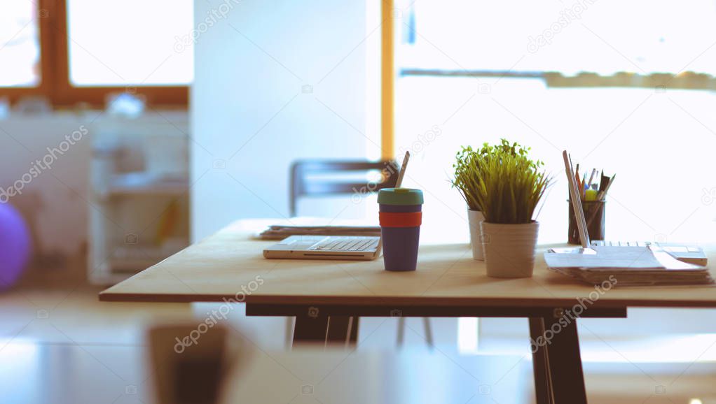 Office workplace with laptop on wood table
