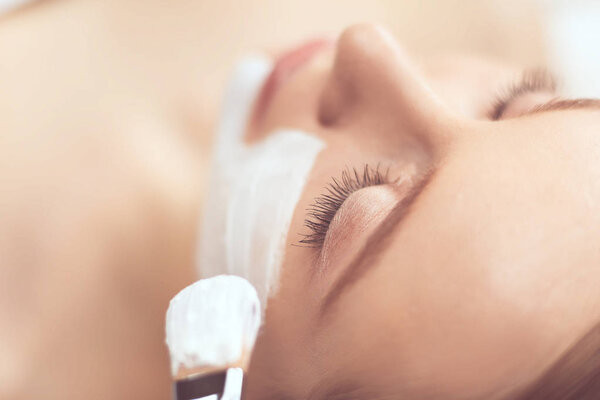 Spa facial mask application. Spa beauty organic facial mask application at day spa salon