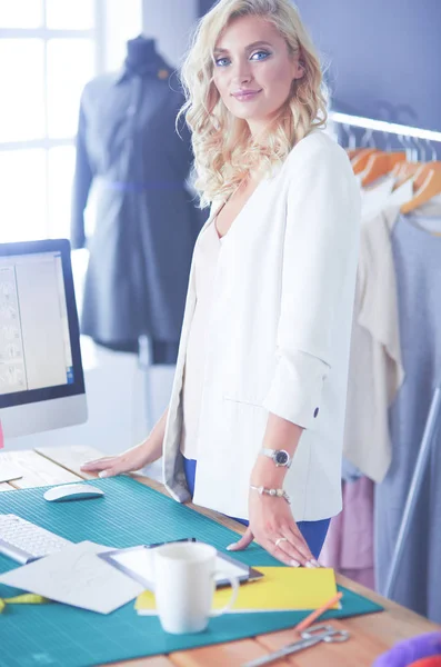 Fashion designer woman working on her designs in the studio. — Stock Photo, Image