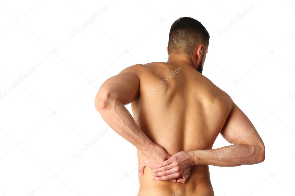 Young man holding his neck in pain. Medical concept