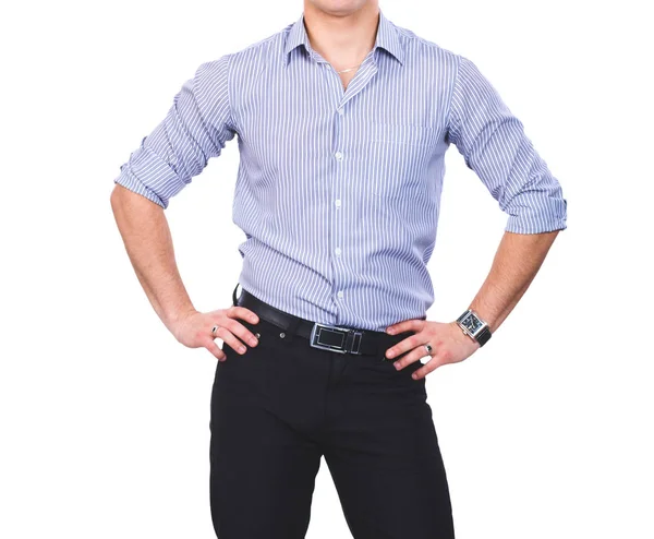 Portret van een jonge man die lacht staande op grijze achtergrond — Stockfoto