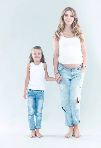 Pregmnant vrouwen en blij meisje. — Stockfoto